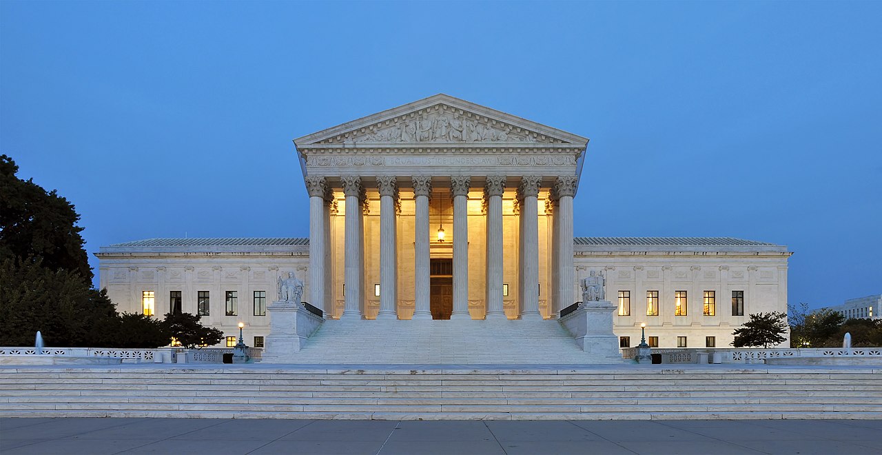 U.S. Supreme Court Building — October Term 2026 - NewsNation Online Exterior of the U.S. Supreme Court building at dusk, with illuminated columns and wide marble steps.